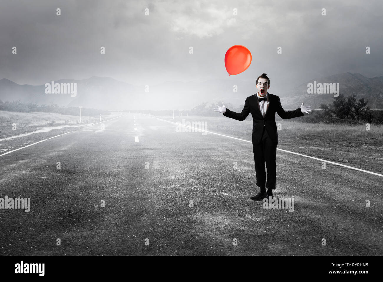 Jeune homme mime. Technique mixte Banque D'Images