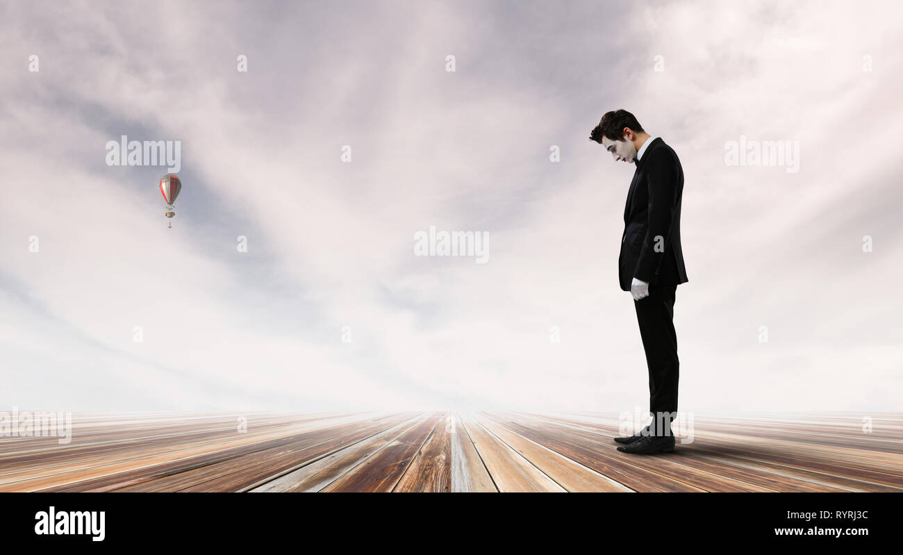 Jeune homme mime. Technique mixte Banque D'Images