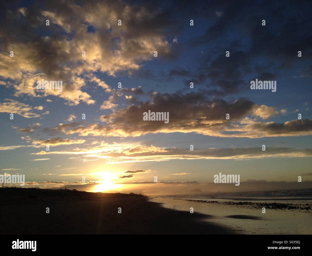 Papamoa beach sunset Banque D'Images