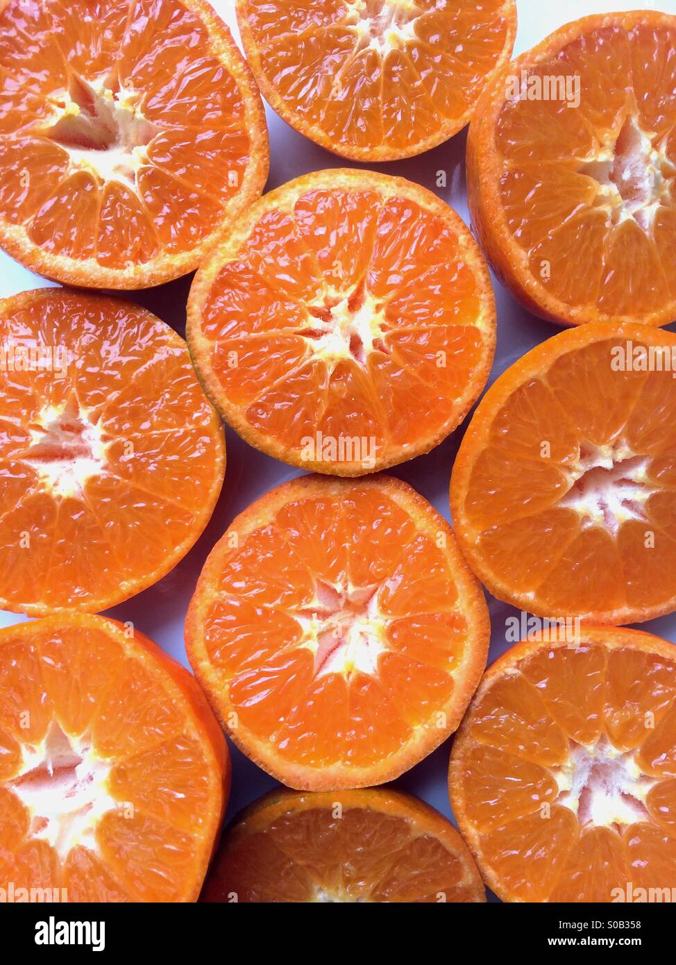 Cet agrume est un croisement entre la mandarine et orange douce. Banque D'Images Cet agrume est un croisement entre la mandarine et orange douce. Banque D'Images