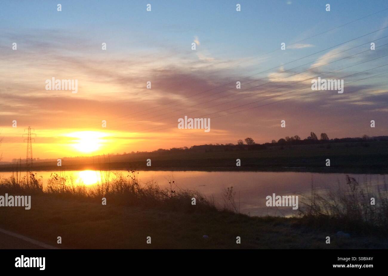 Lever de soleil sur l'fen vidanger Banque D'Images