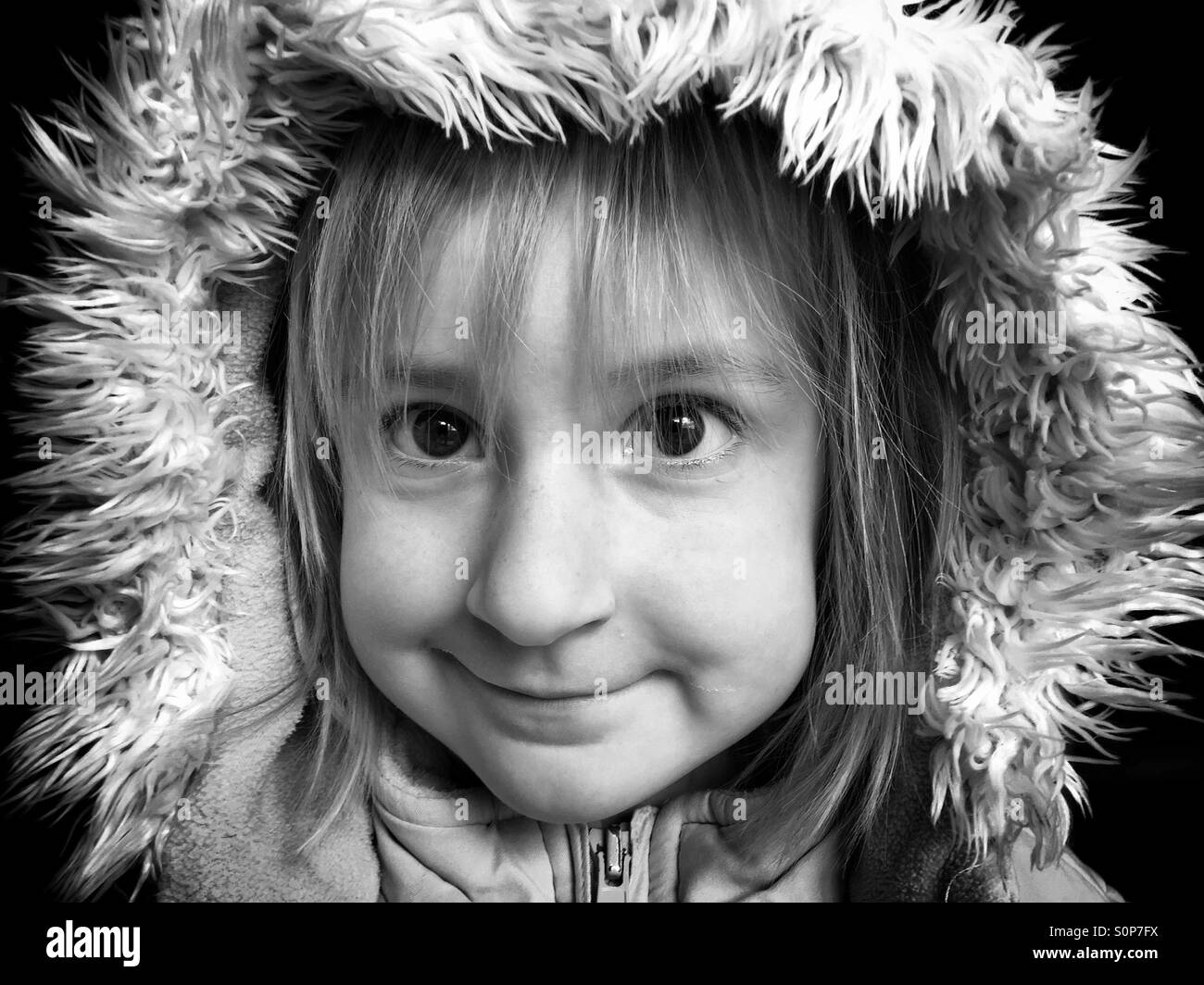 Girl in winter coat Banque D'Images