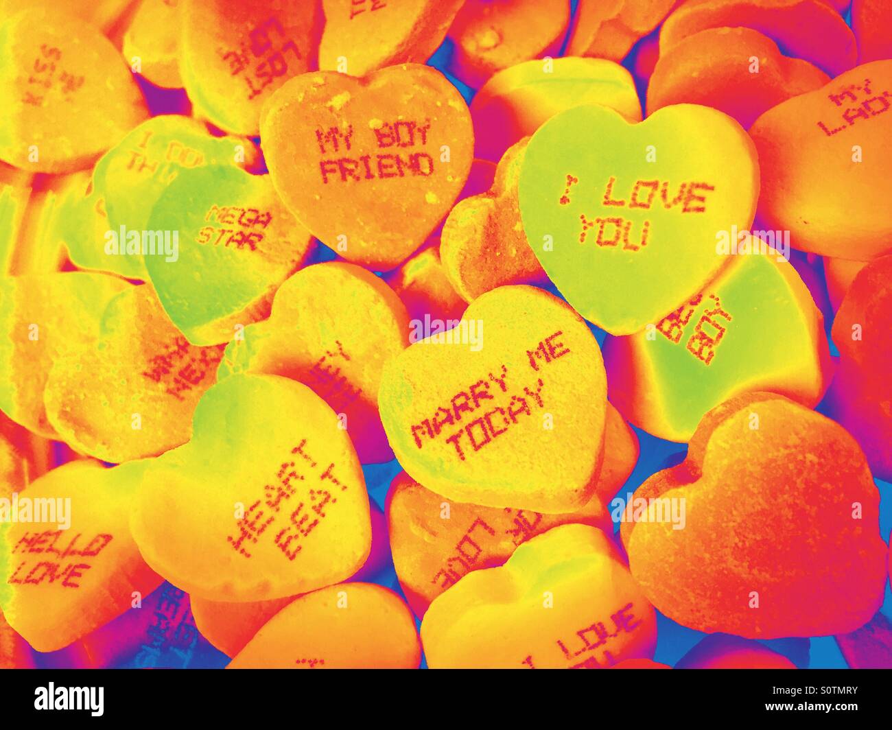 Red Hot Valentines Day hearts conversation candy. Banque D'Images