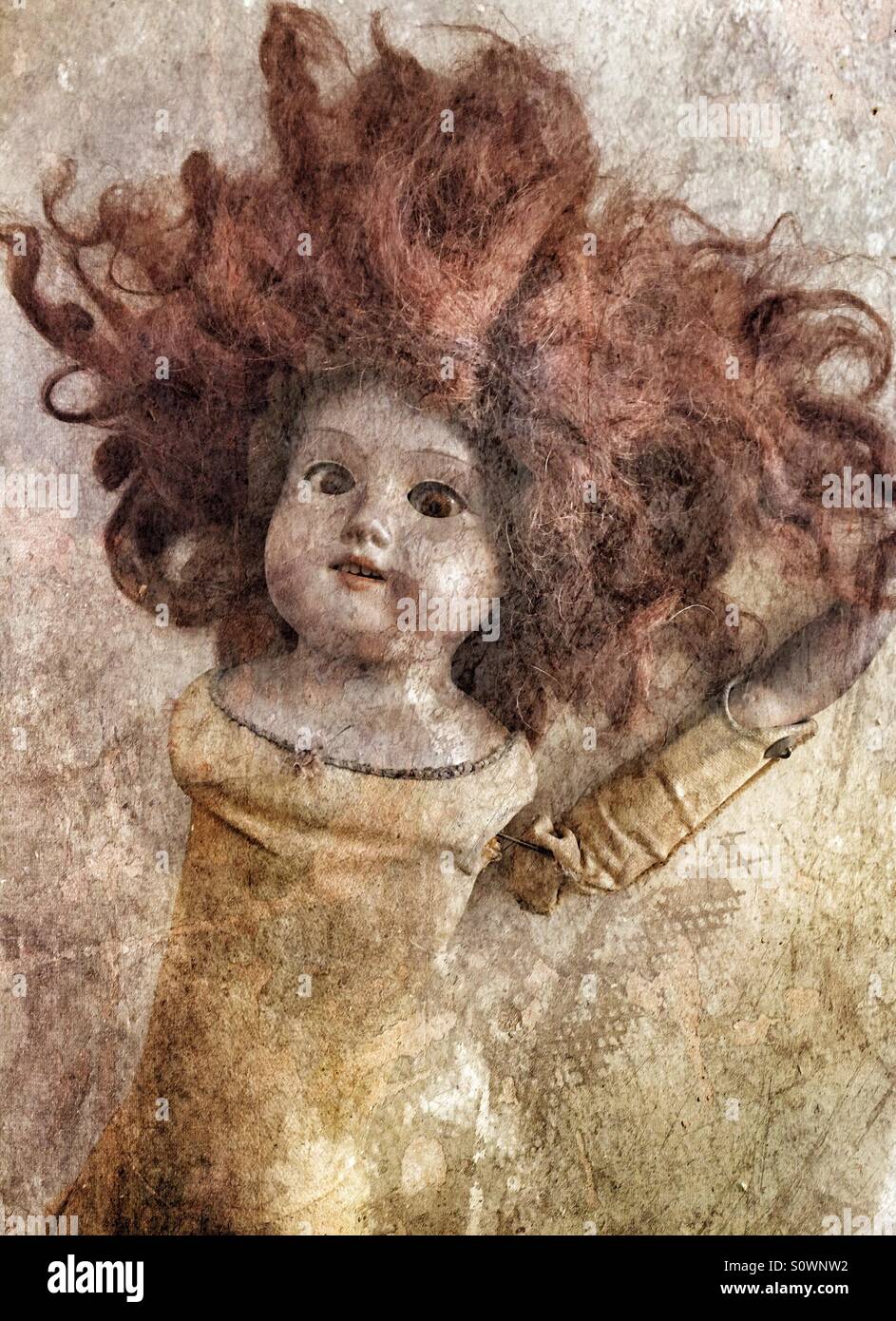 Un vieux creepy doll avec art texture Banque D'Images