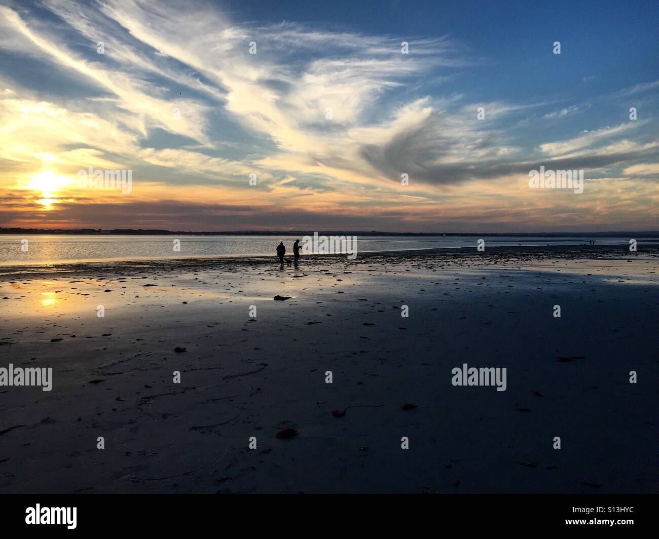 Coucher du soleil sur la plage de West Wittering Banque D'Images