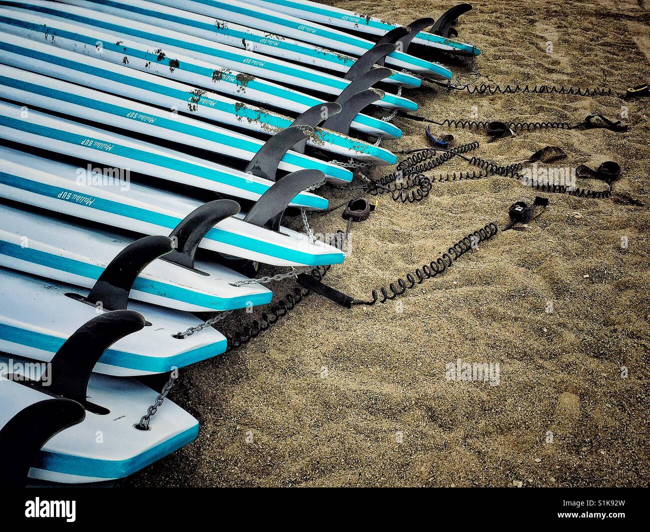 Chaîne hôtelière Paddleboards sur une plage - Image de stock capturée avec un smartphone