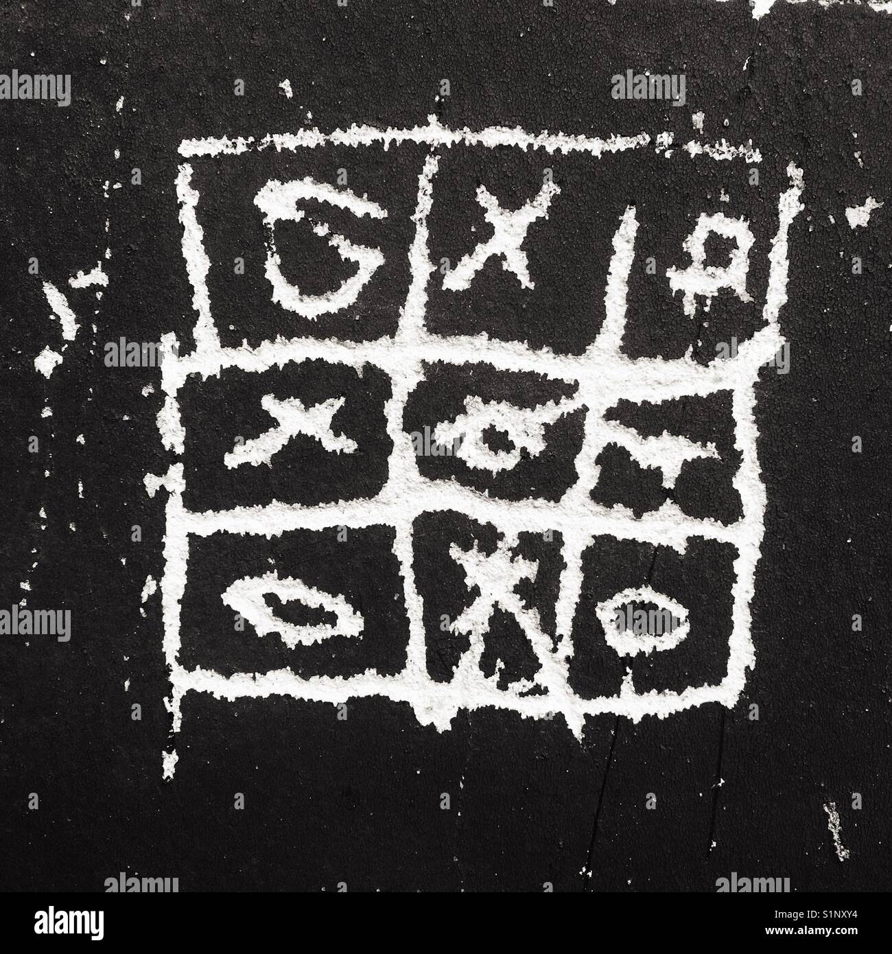 Un jeu de morpion et de croix sur un mur Banque D'Images