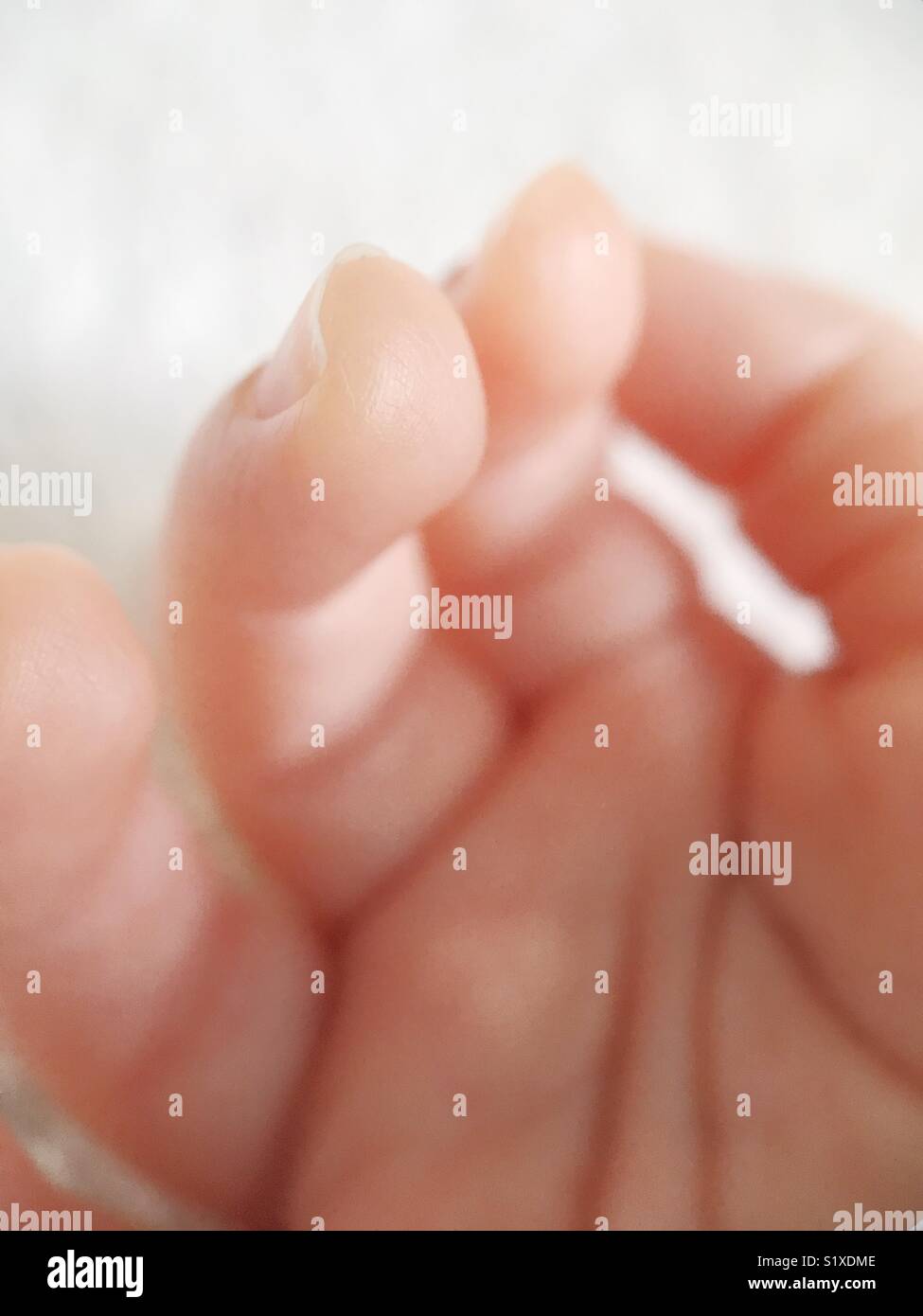Photo macro d'un doigts du bébé. Banque D'Images