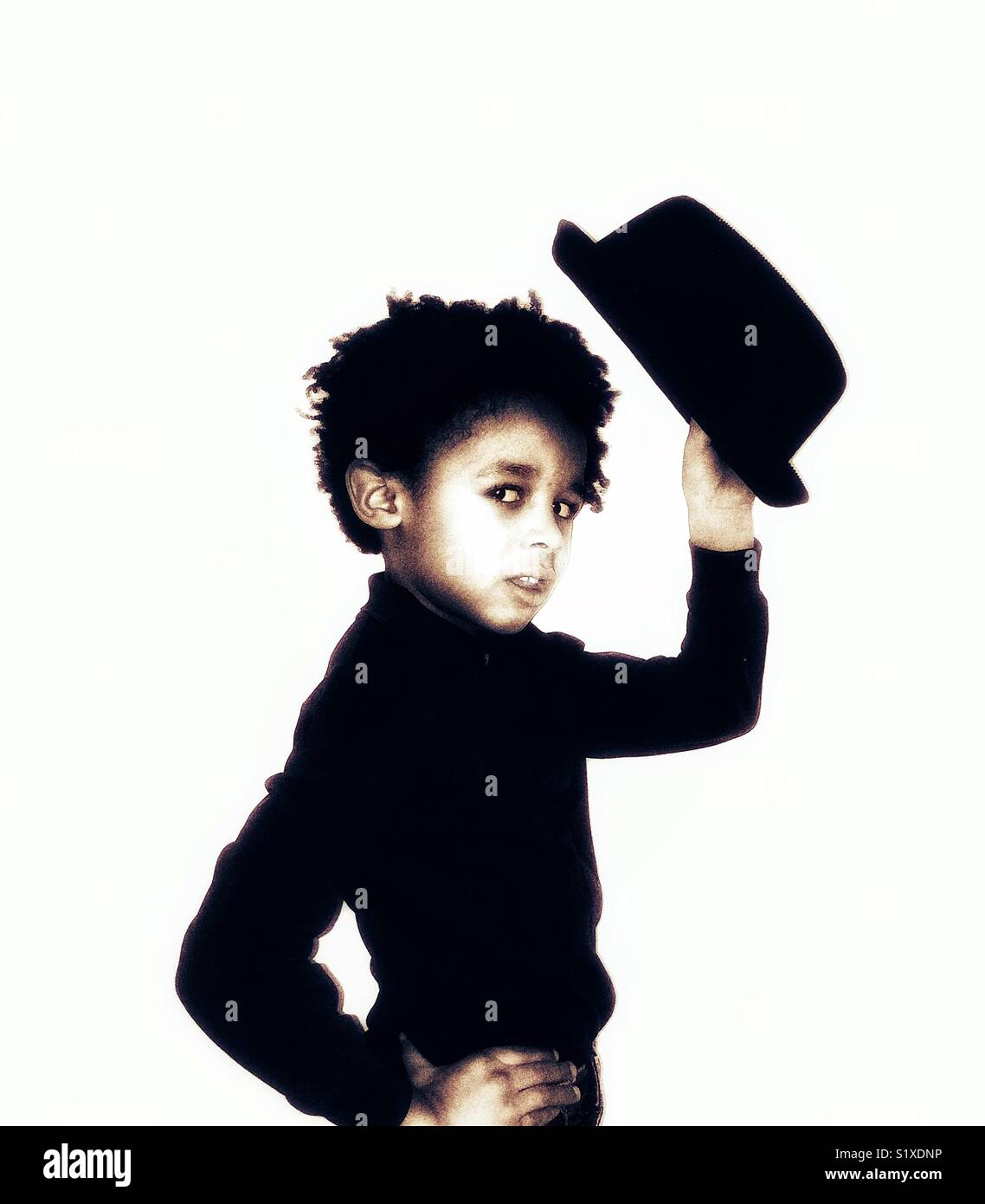 Boy posing with a hat Banque D'Images
