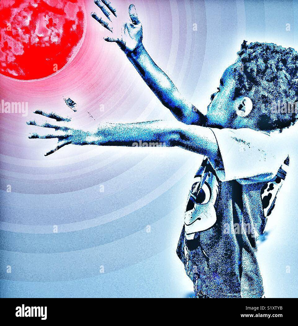 Un enfant et la planète rouge. - Image de stock capturée avec un smartphone