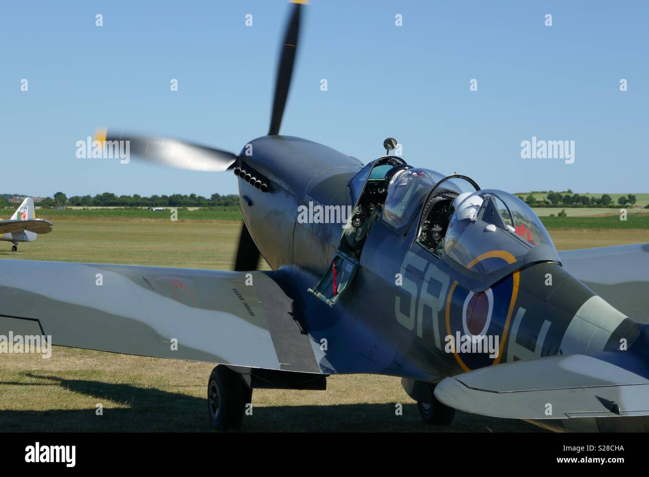 Le roulage de Spitfire à décoller à l'Aérodrome de Duxford, UK Banque D'Images