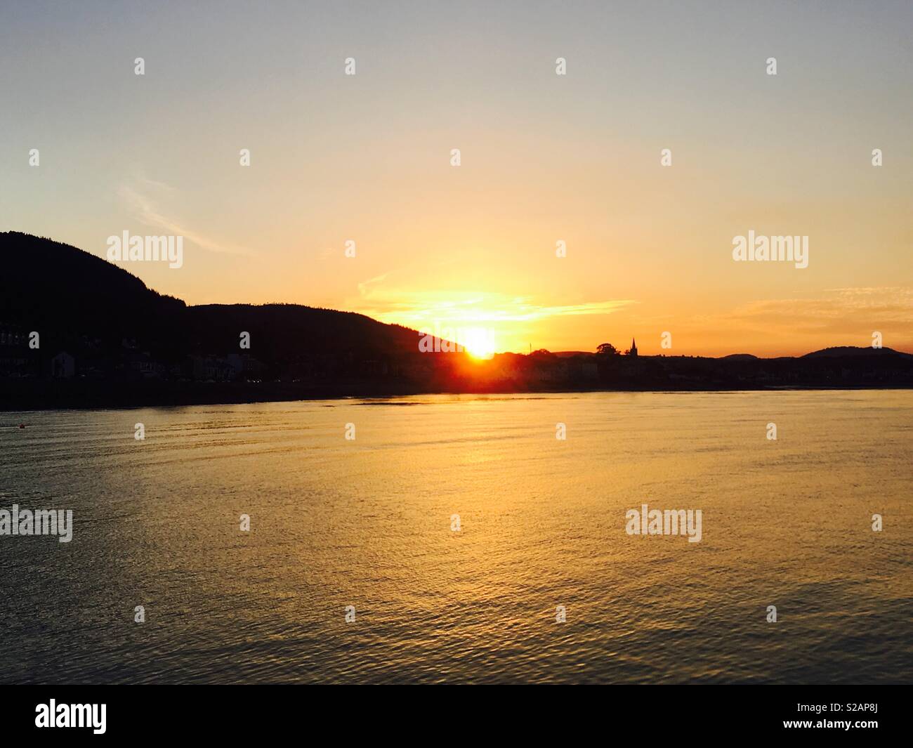Coucher de soleil sur le port de Newcastle, comté de Down, Irlande du Nord Banque D'Images