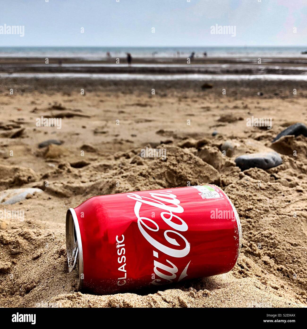 Coca Cola sur la plage Banque D'Images