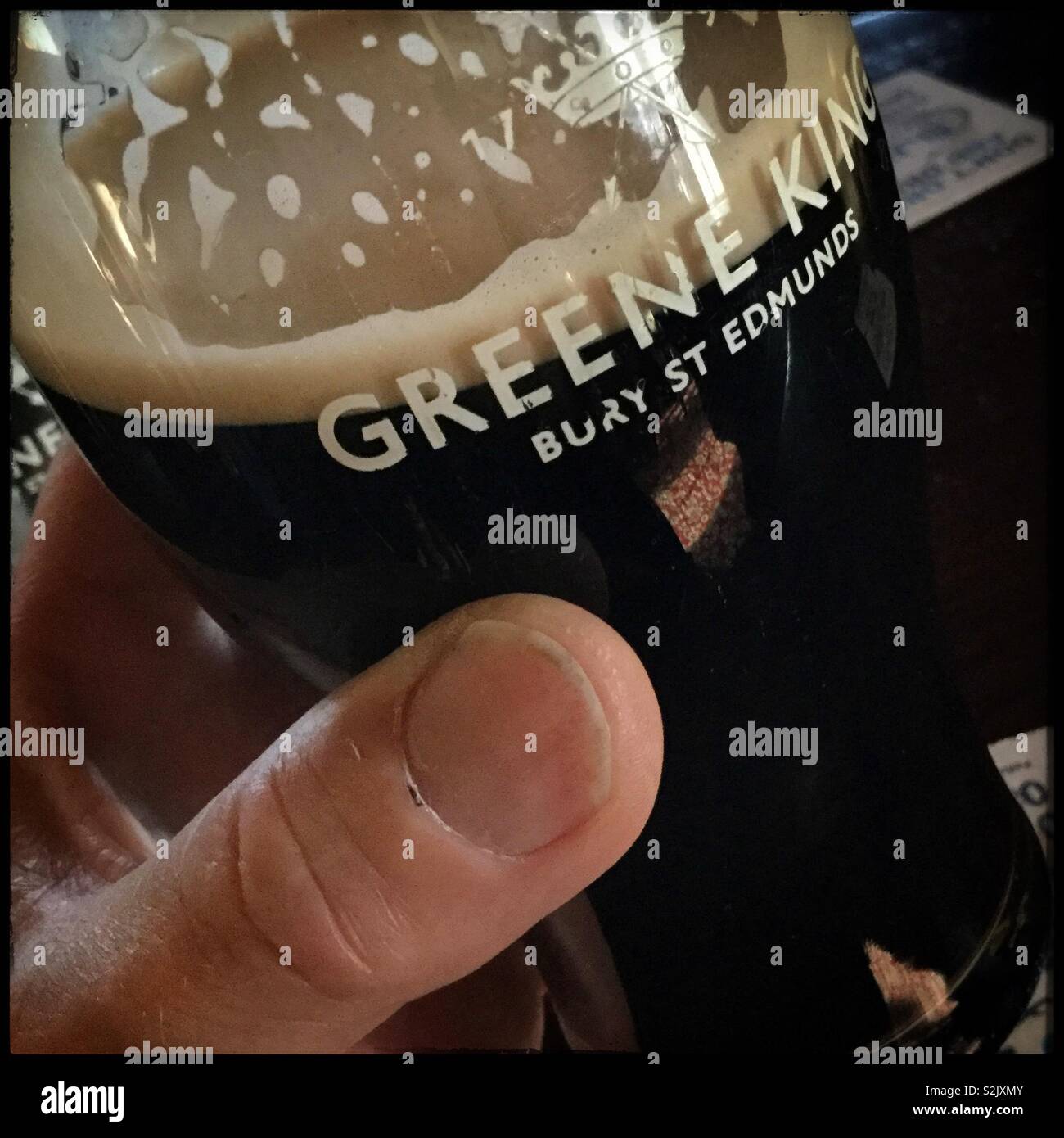 Une pinte de stout. Banque D'Images
