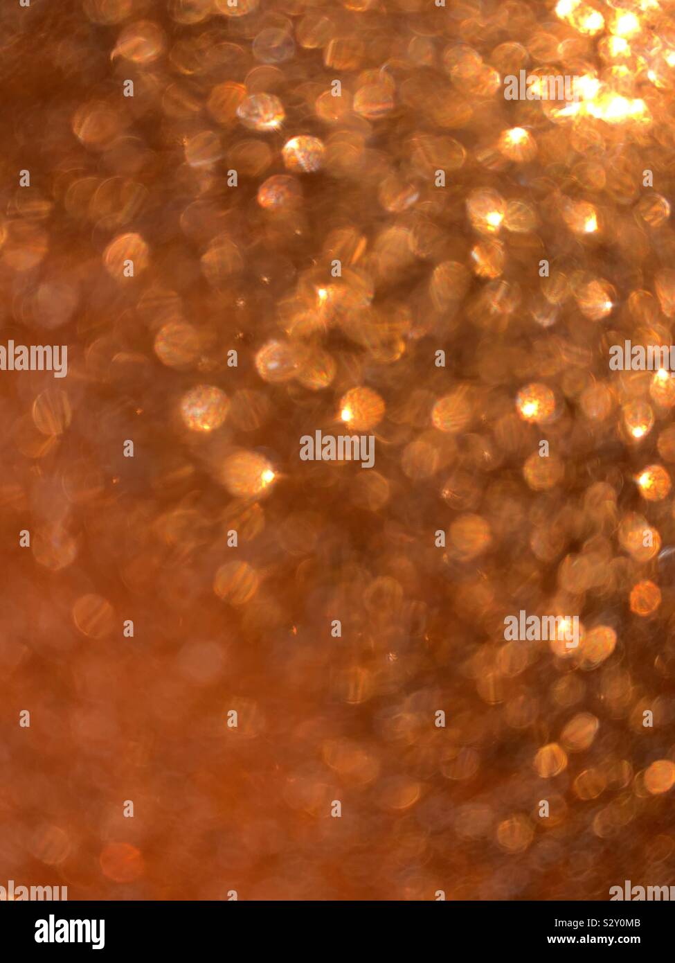 Abstract, orange glitter Banque D'Images