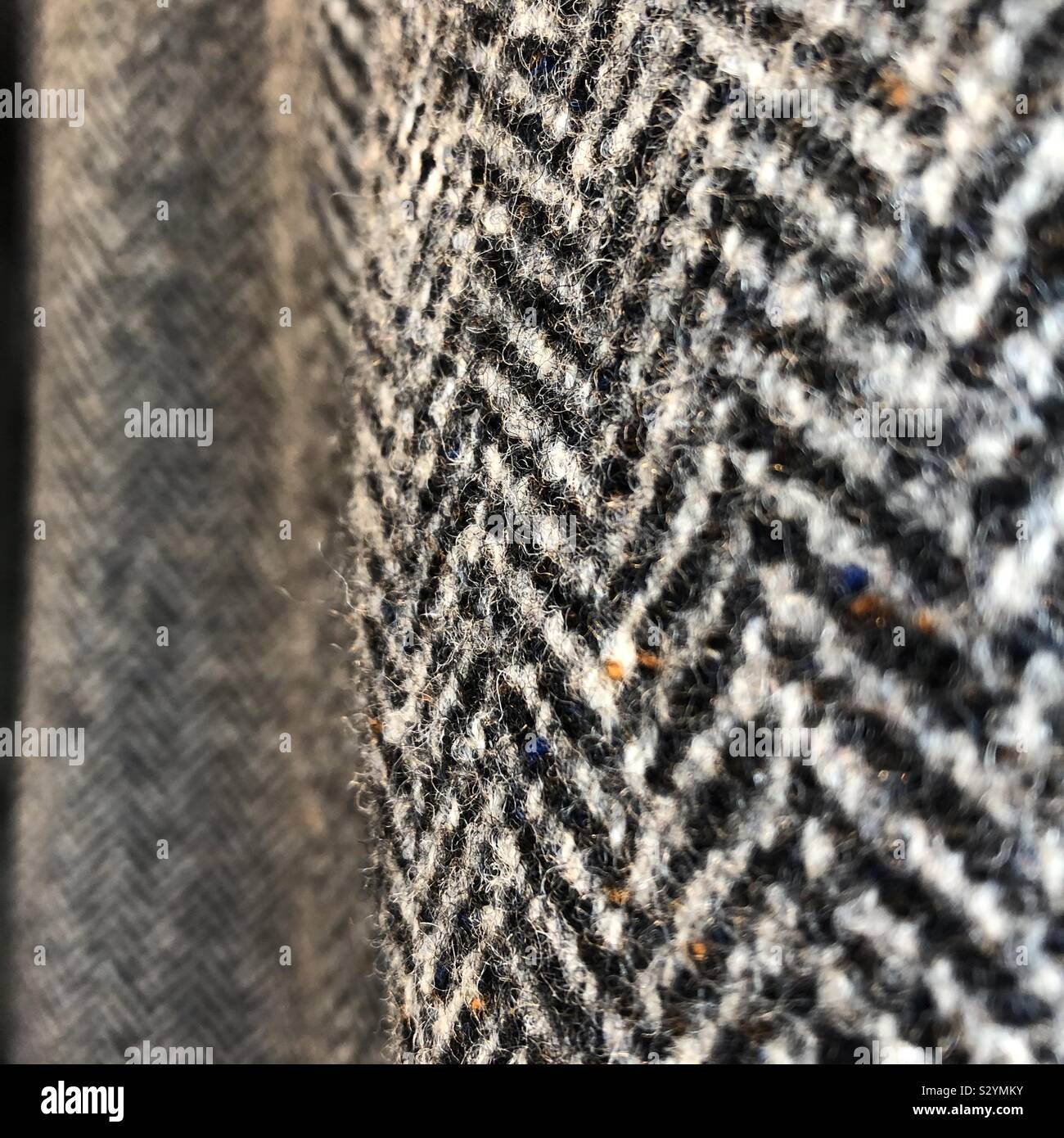 Herringbone tweed tissu de laine Manteau veste closeup Banque D'Images