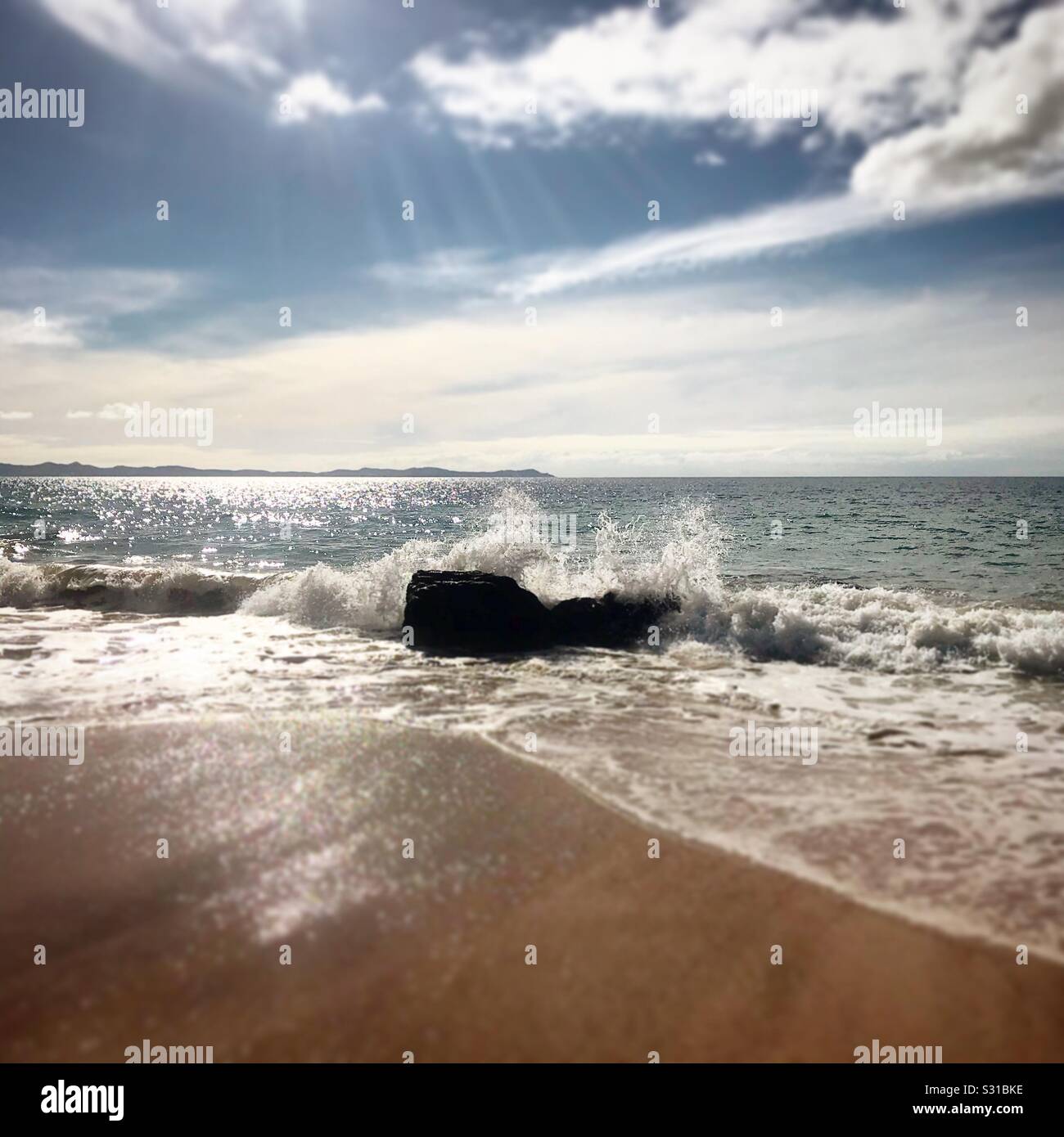 La vague s'écraser. Baie de câble, Nouvelle-Zélande Banque D'Images