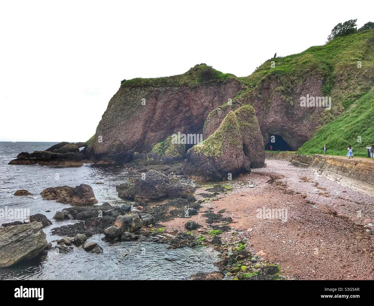 Grottes de Cushendun en Irlande du Nord utilisées dans le tournage de Game of Thrones Banque D'Images