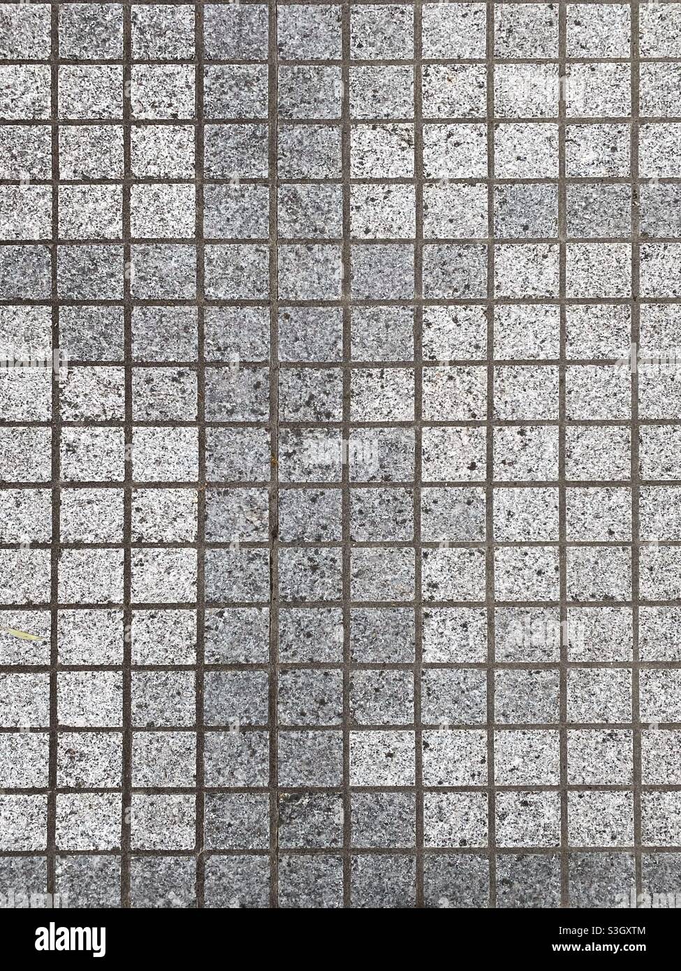 Une photographie de carreaux de sol carrés - Image de stock capturée avec un smartphone