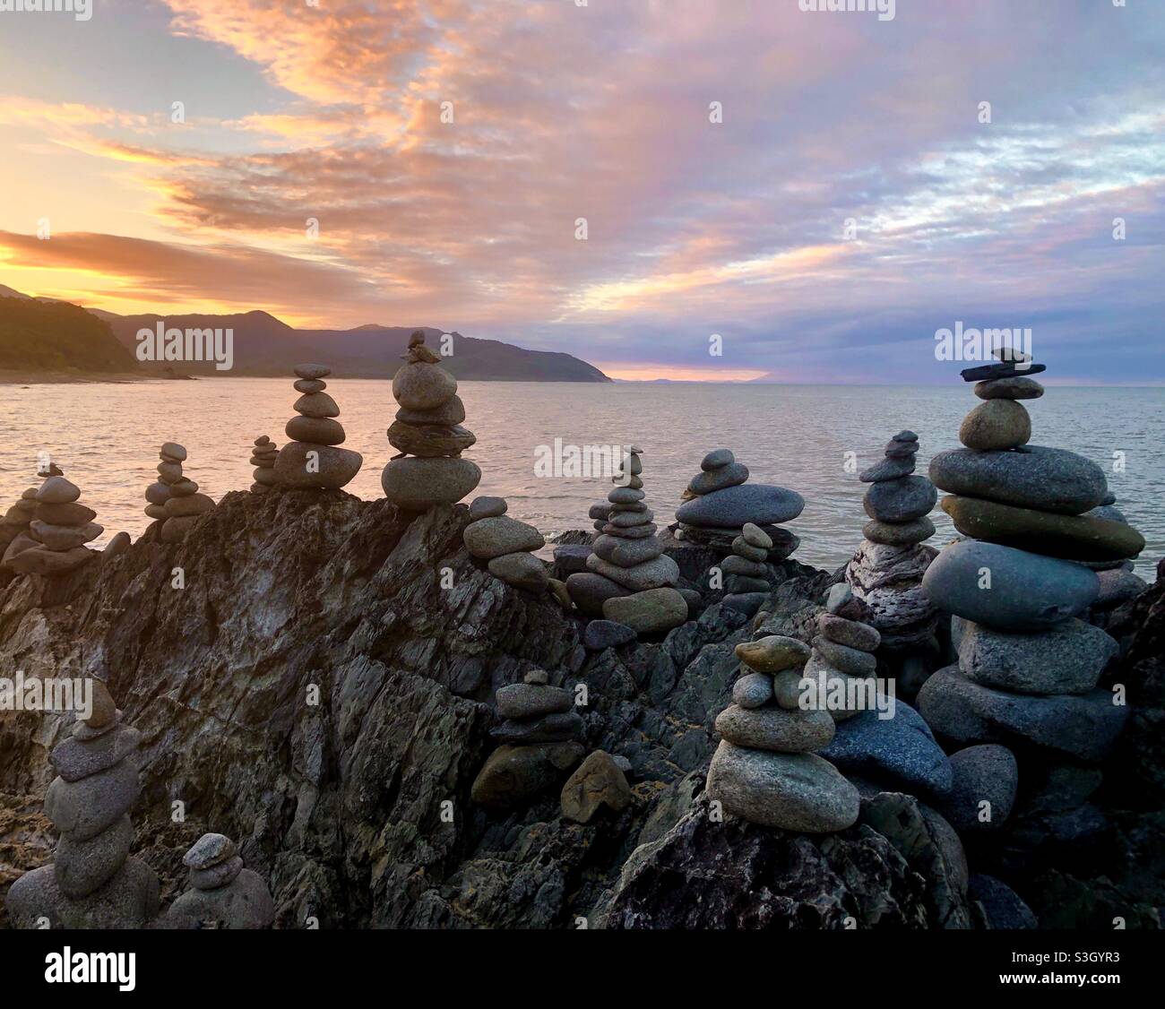 Gatz Rock piles de pierres Port Douglas Cairns coucher de soleil Banque D'Images