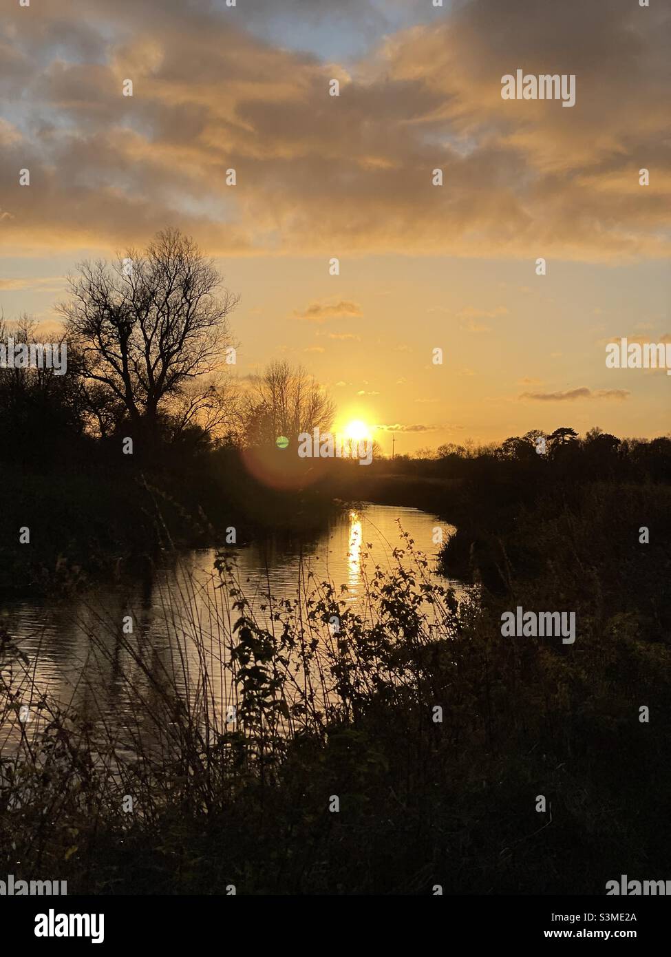 Coucher de soleil sur la rivière Ouse Cambridgeshire lumière du soleil Banque D'Images