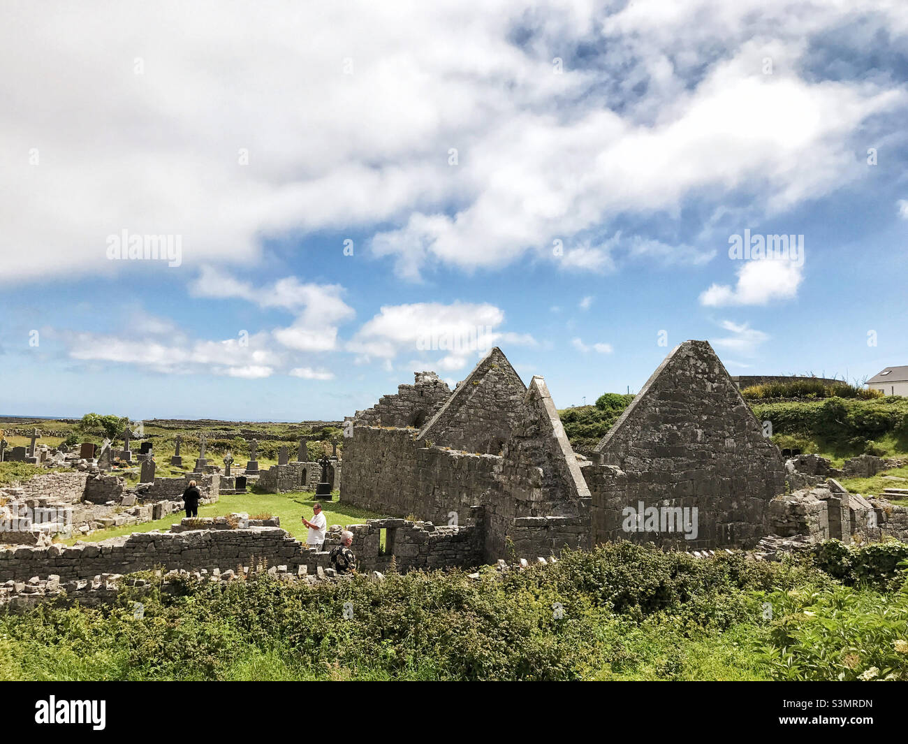Ruines et cimetière de la colonie monastique des sept Églises sur l'île d'Aran d'Inis Mor.Irlande. Banque D'Images