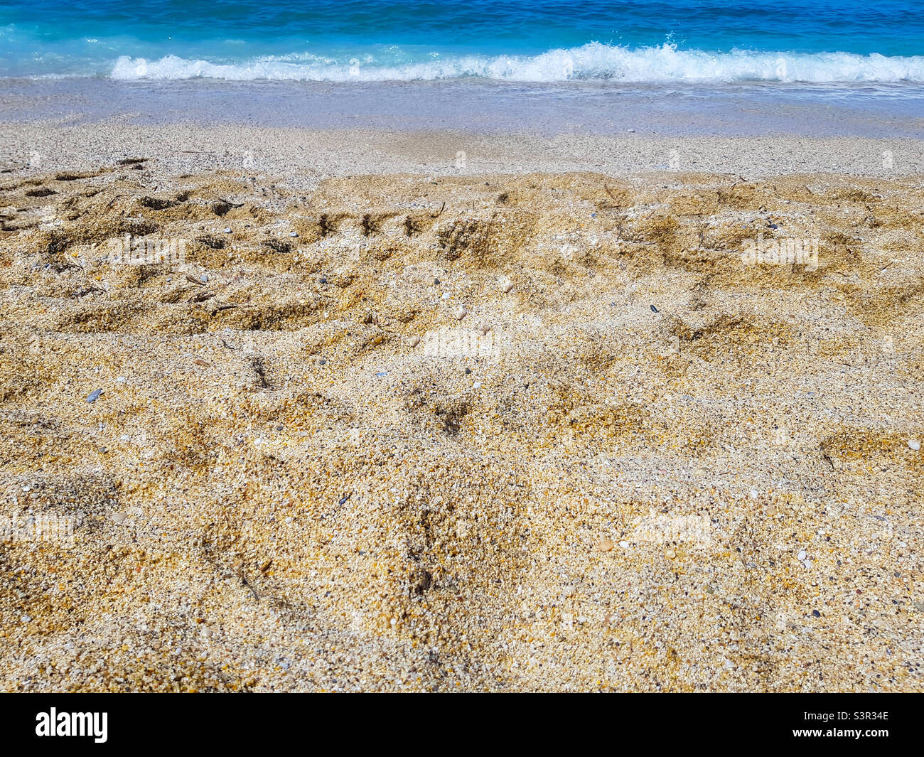 Sable de mer sur la plage de Cleopatra à Alanya, Turquie - Image de stock capturée avec un smartphone