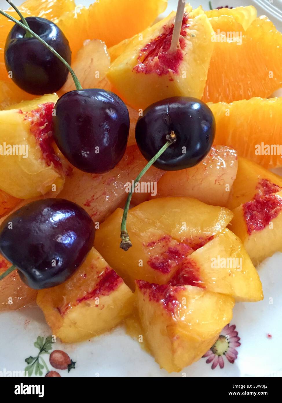 Nectarines, oranges et cerises fraîches Banque D'Images