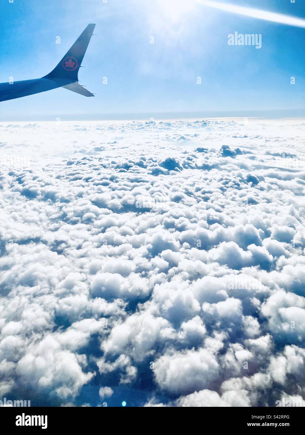 Au-dessus des nuages avec Air Canada. Banque D'Images