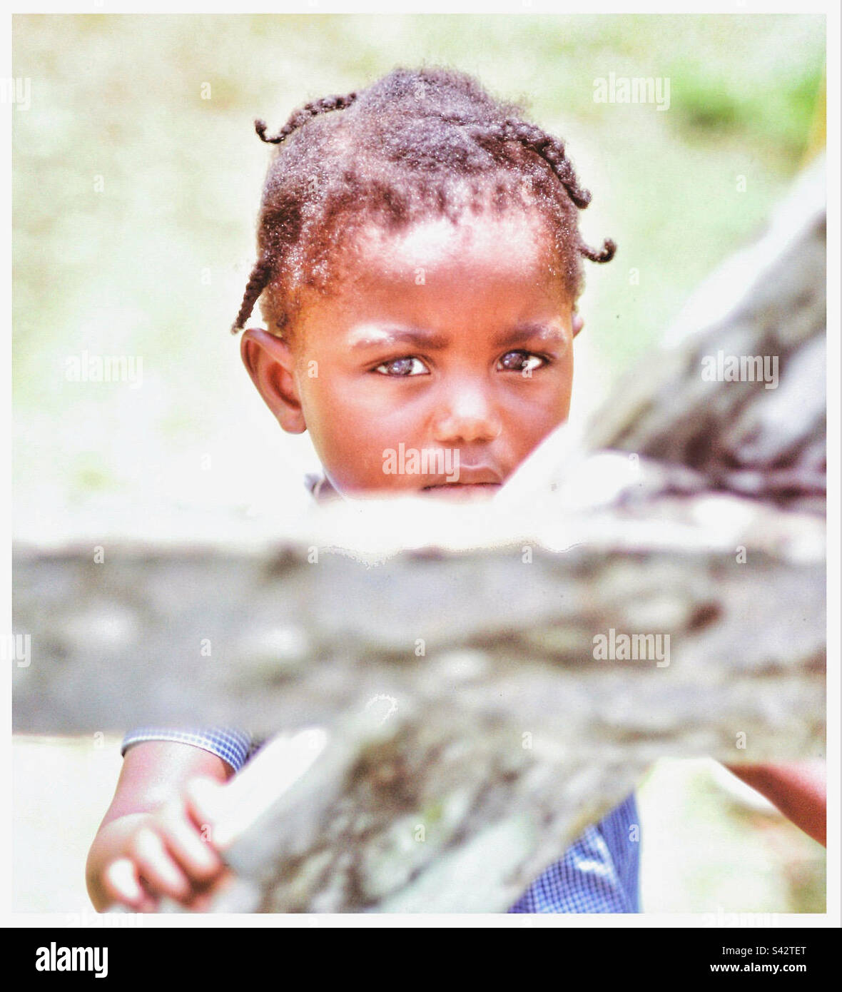 Un enfant jamaïcain. - Image de stock capturée avec un smartphone
