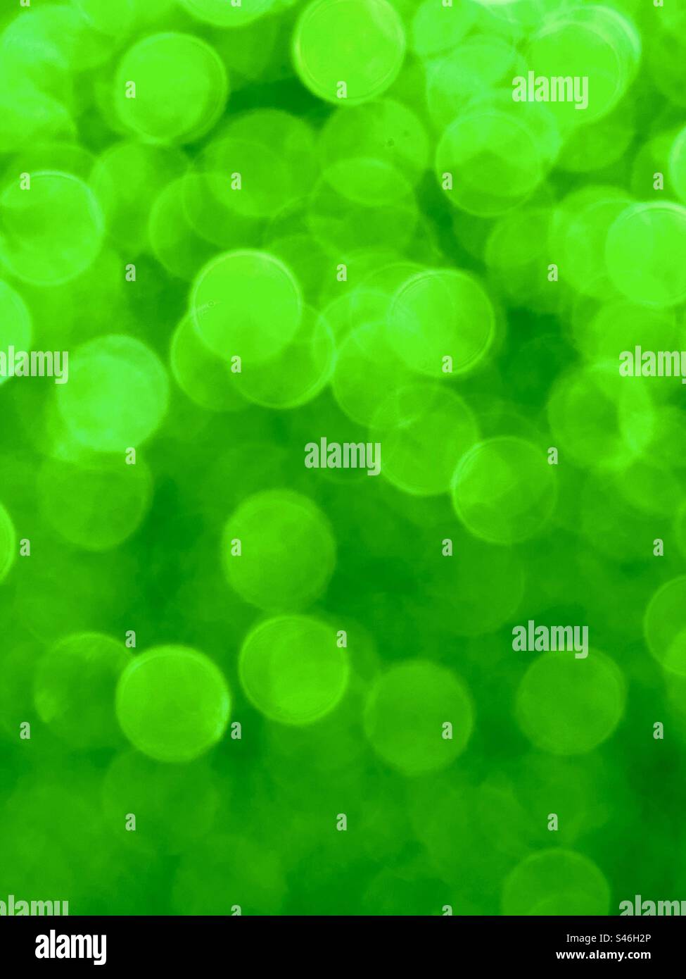 Bokeh brillant vert fluo Banque D'Images