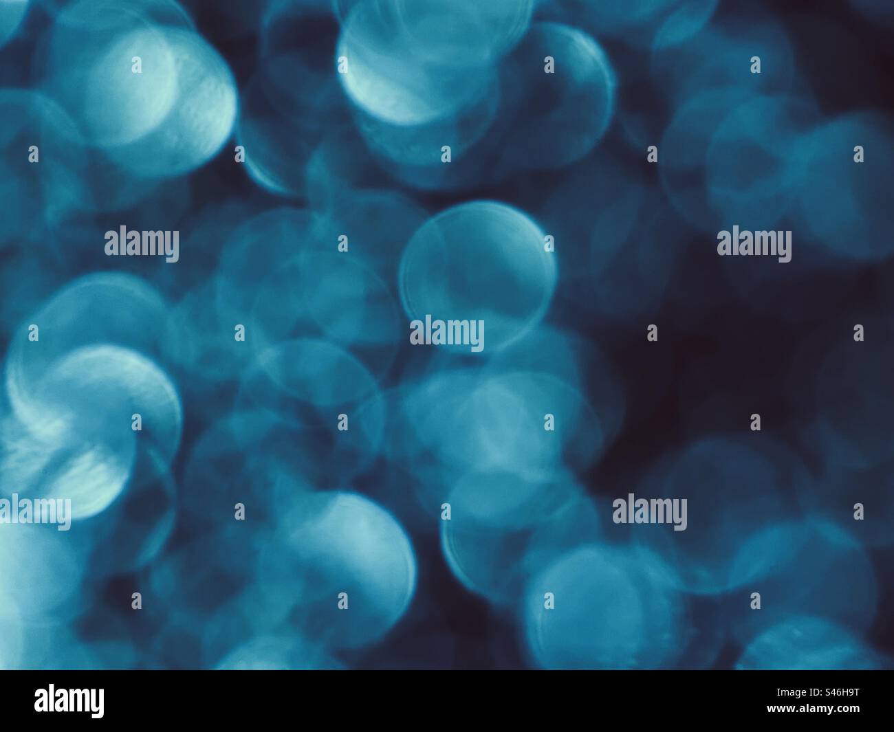 Fond de bokeh bleu pailleté Banque D'Images