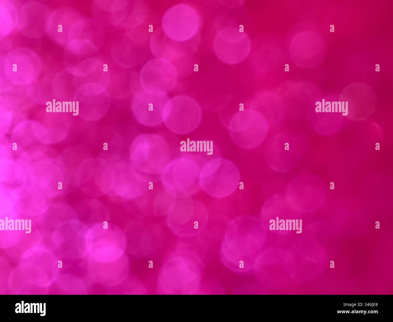 Fond de bokeh rose chaud pailleté Banque D'Images