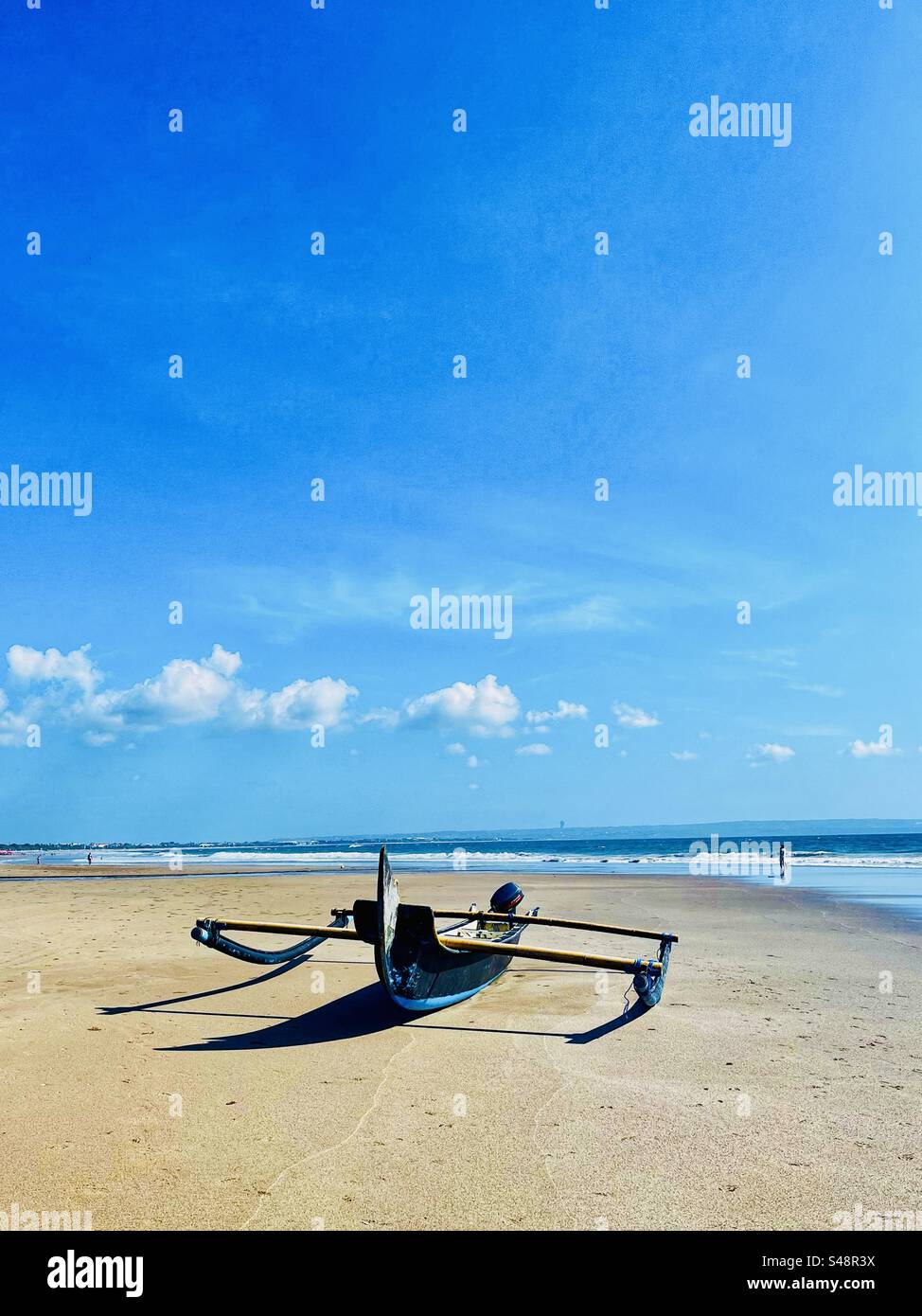 Bateau de pêche sur la plage à Bali Indonésie Banque D'Images