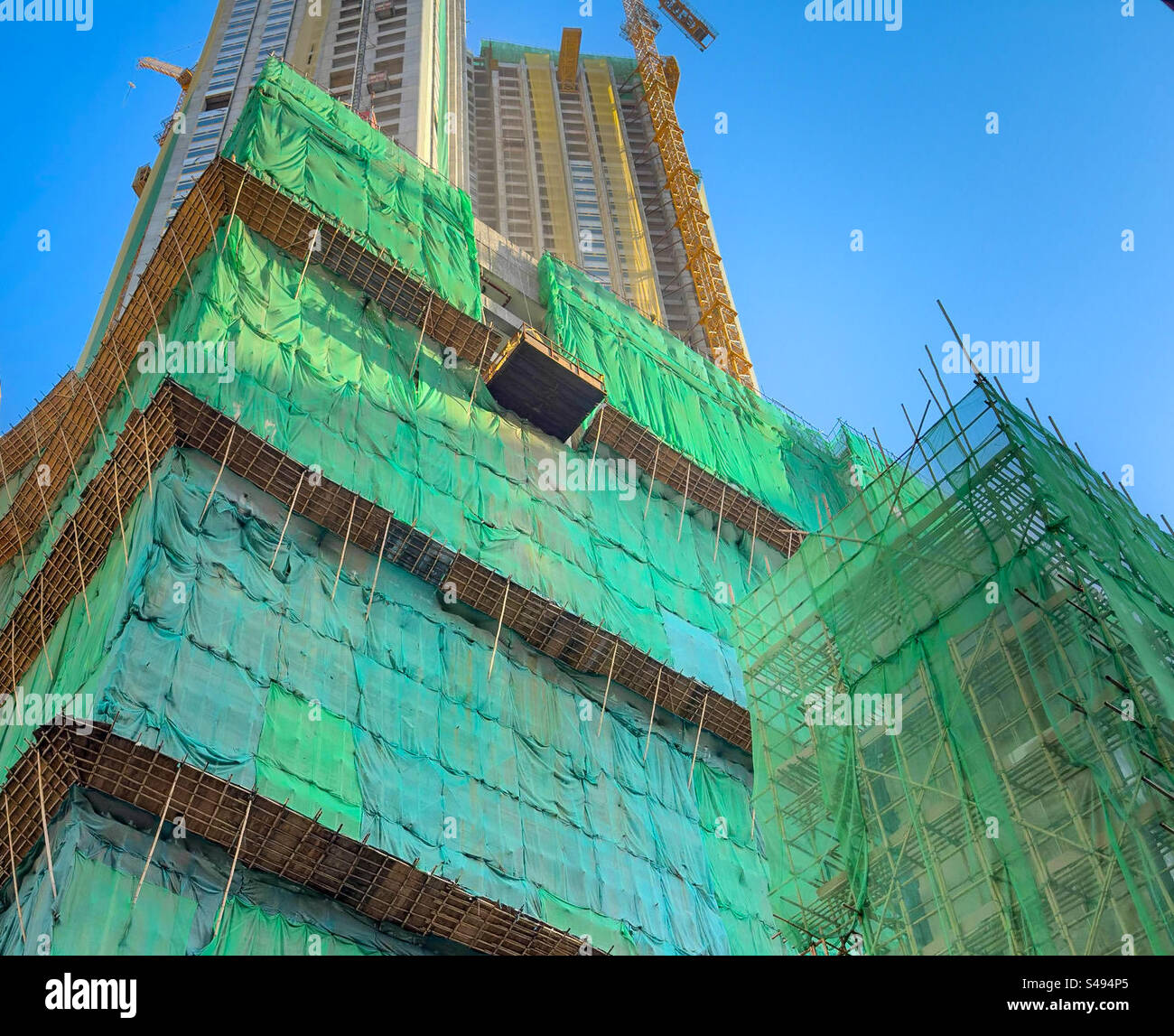 Échafaudage en bambou dans une nouvelle construction de grande hauteur à Hong Kong Banque D'Images