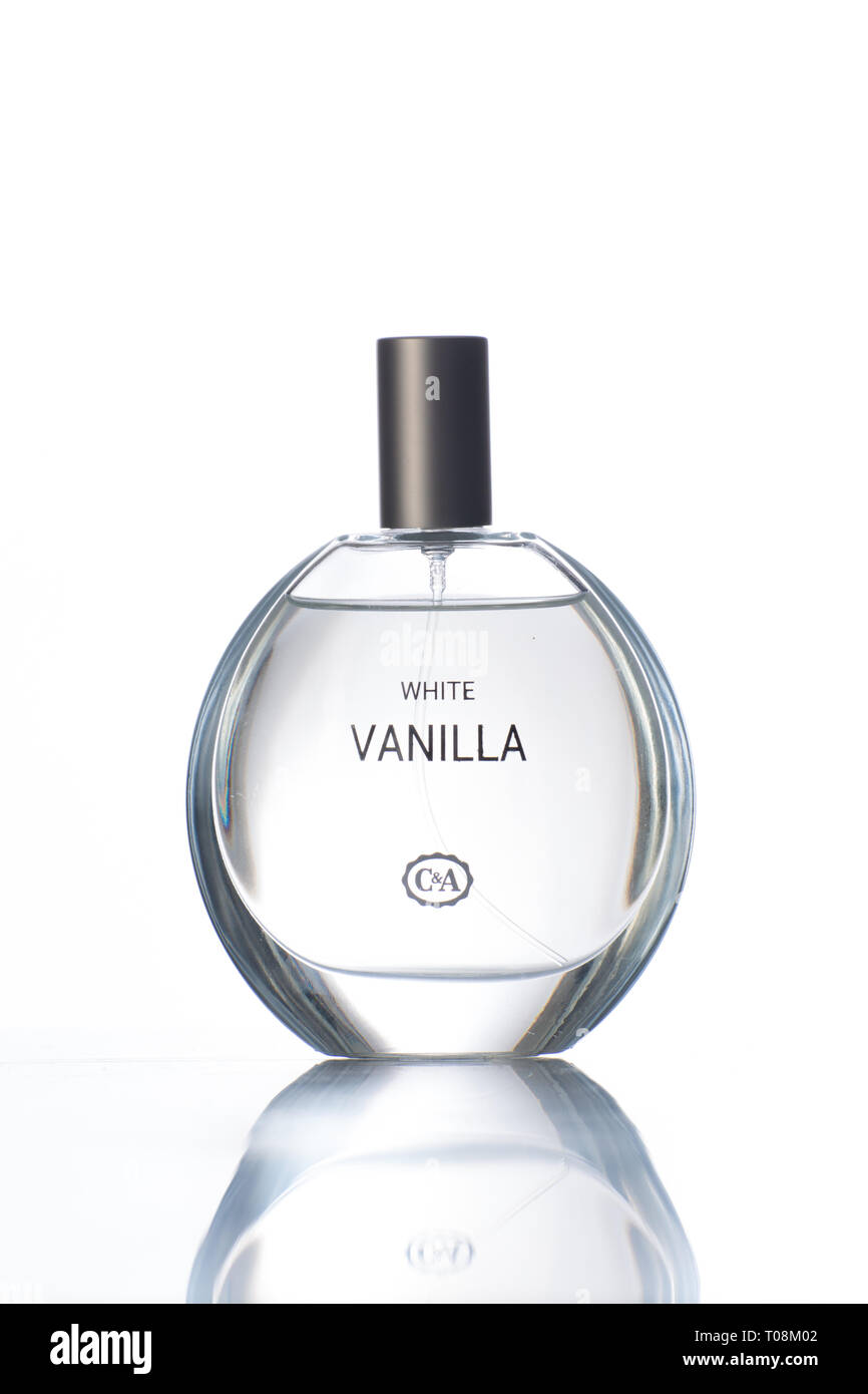 Flacon de parfum vanille blanc Banque D'Images