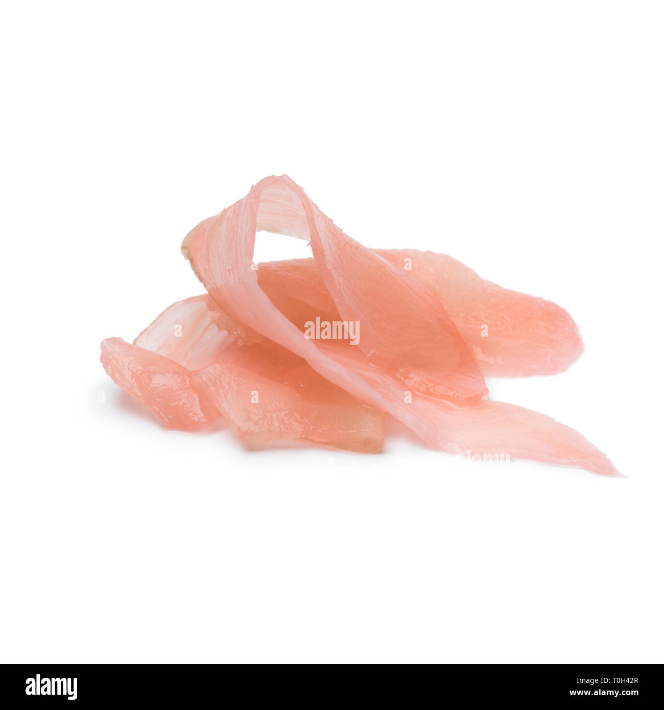 Tranches de gingembre mariné sushi rose isolé sur fond blanc Banque D'Images