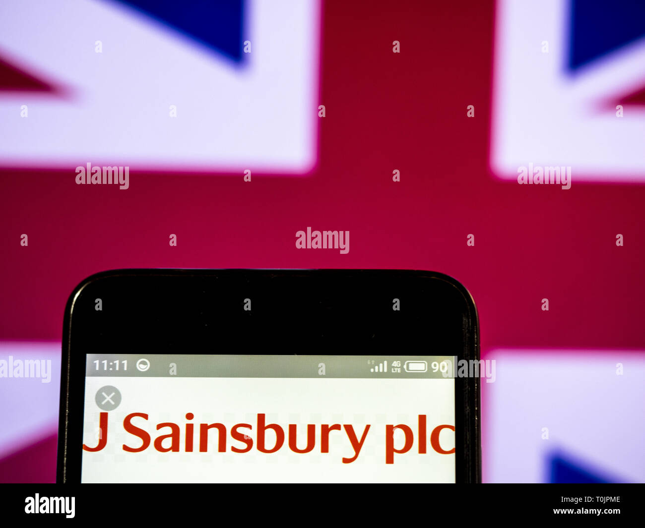 L'Ukraine. Mar 20, 2019. J Sainsbury plc logo de l'entreprise vu affichée sur un téléphone intelligent. Crédit : Igor Golovniov SOPA/Images/ZUMA/Alamy Fil Live News Banque D'Images