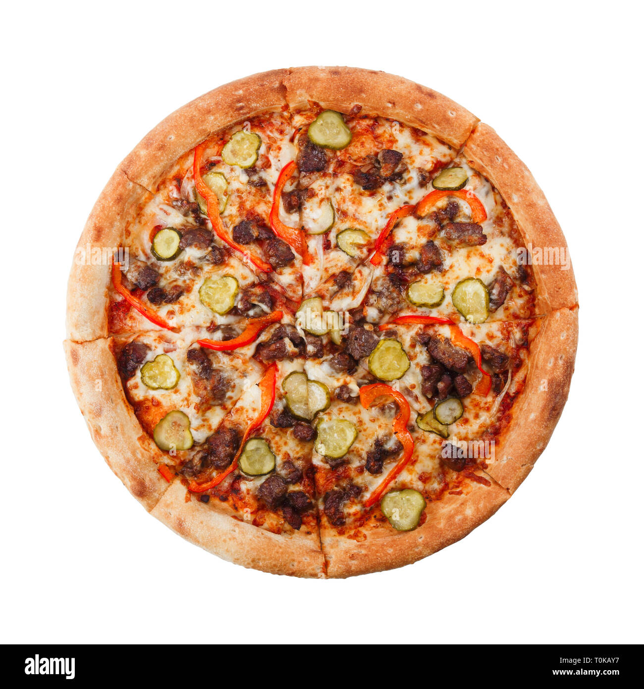 Pizza mexicaine Tradition avec le poivre, la viande bovine et des cornichons. Arrosée d'une sauce à l'ail. Vue d'en haut. Banque D'Images