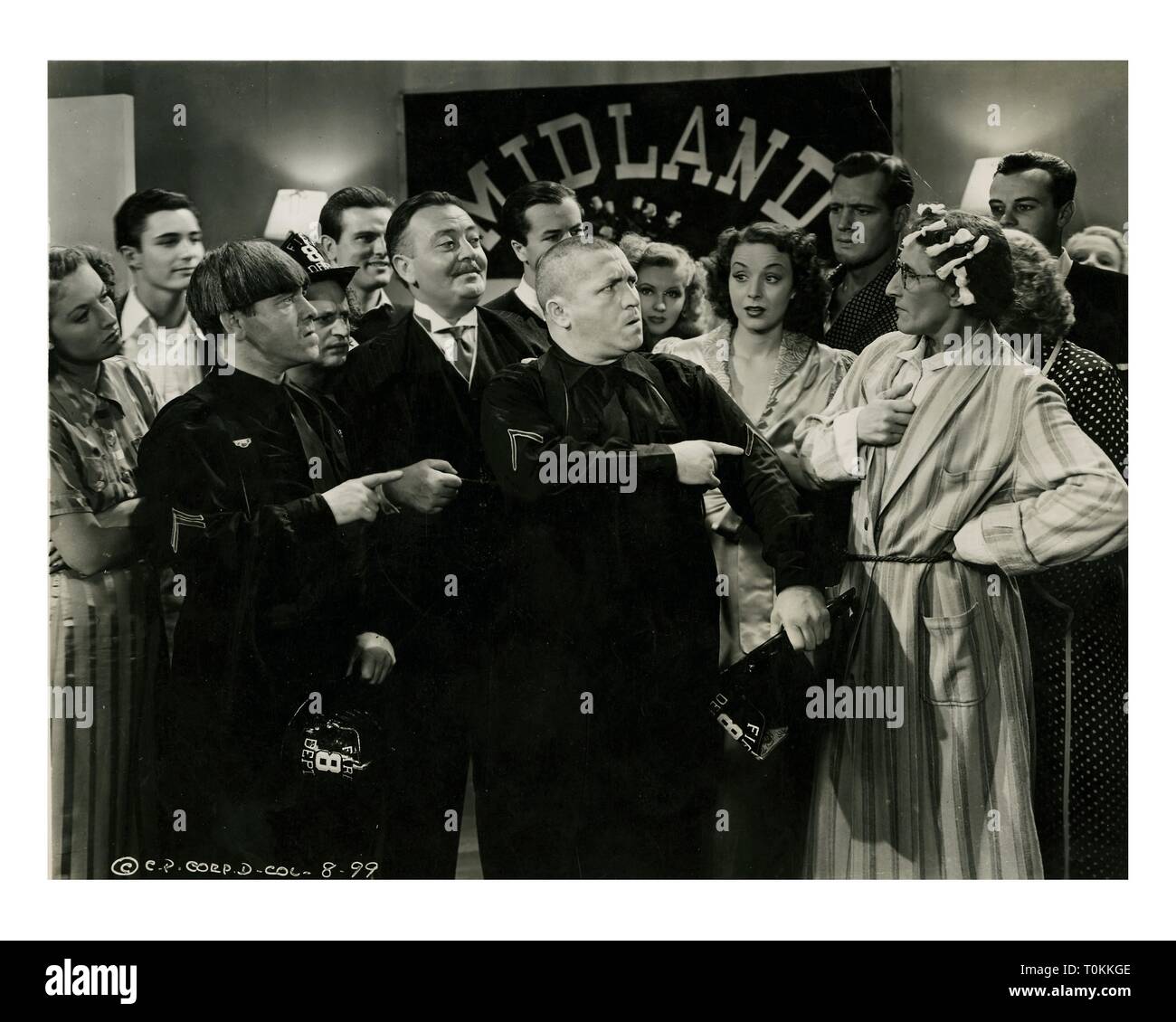 Années 1930 Plus d'un demi-siècle depuis leur dernier court-métrage est sorti, les trois Stooges demeurent populaires auprès du public. Leurs films n'ont jamais quitté la télévision américaine depuis la première apparaissant en 1958, et ils continuent de ravir des anciens fans tout en attirant de nouveaux visiteurs. Ils étaient un groupe d'humoristes qui n'ont jamais été les chouchous de la critique, une loi durable qui ont connu plusieurs changements de personnel dans leur carrière qui aurait mis à l'écart de façon permanente une loi moins persistants. Hollywood : Crédit Photo Archive / MediaPunch Banque D'Images