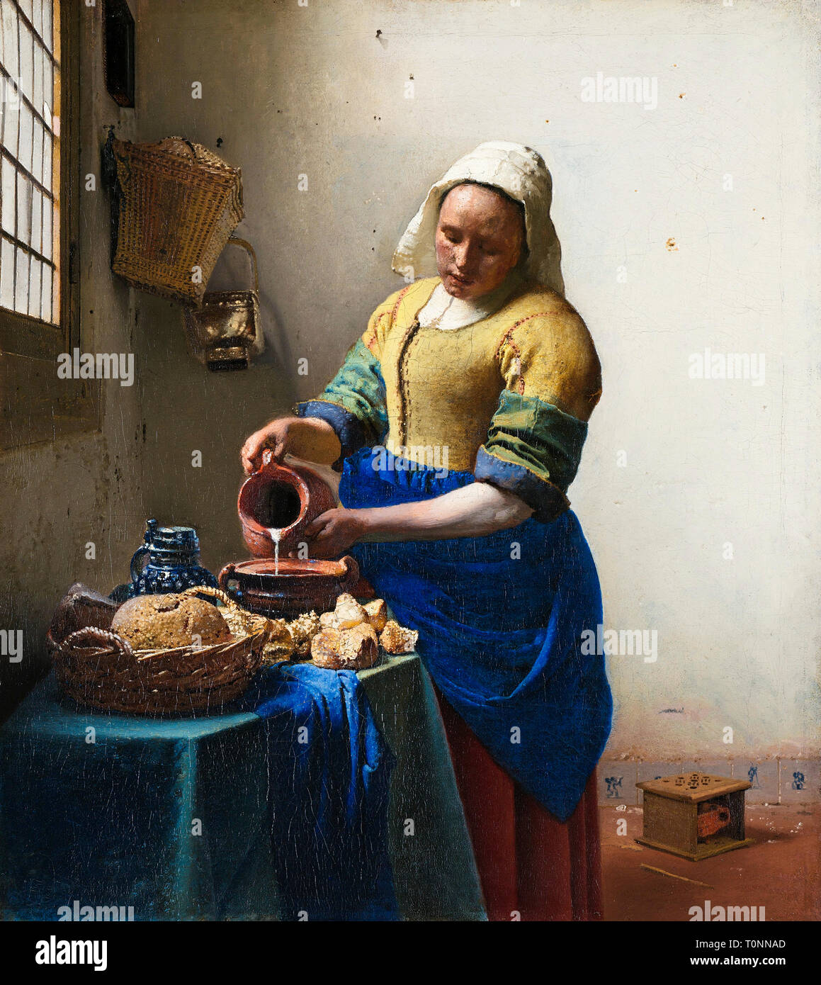 Johannes Vermeer, la Milkmaid, peinture baroque, vers 1660 Banque D'Images