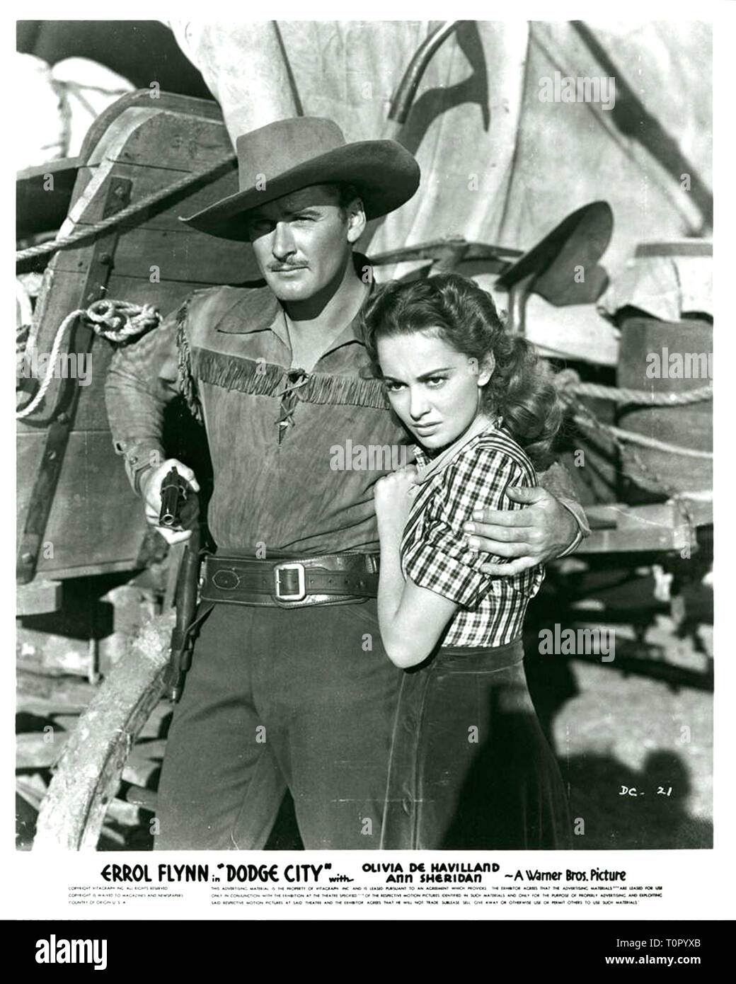 1939 western américain réalisé par Michael Curtiz avec Errol Flynn, Olivia de Havilland, et Ann Sheridan. Basé sur une histoire de Robert Buckner, le film est au sujet d'un bétail de Texas agent qui est témoin de l'anarchie brutale de Dodge City, Kansas et prend le poste de shérif pour nettoyer la ville. Filmé au début de Technicolor, Dodge City était l'un des films de l'année. C'était la 7ème des 11 films que de Havilland et Flynn paru dans ensemble. Hollywood : Crédit Photo Archive / MediaPunch Banque D'Images