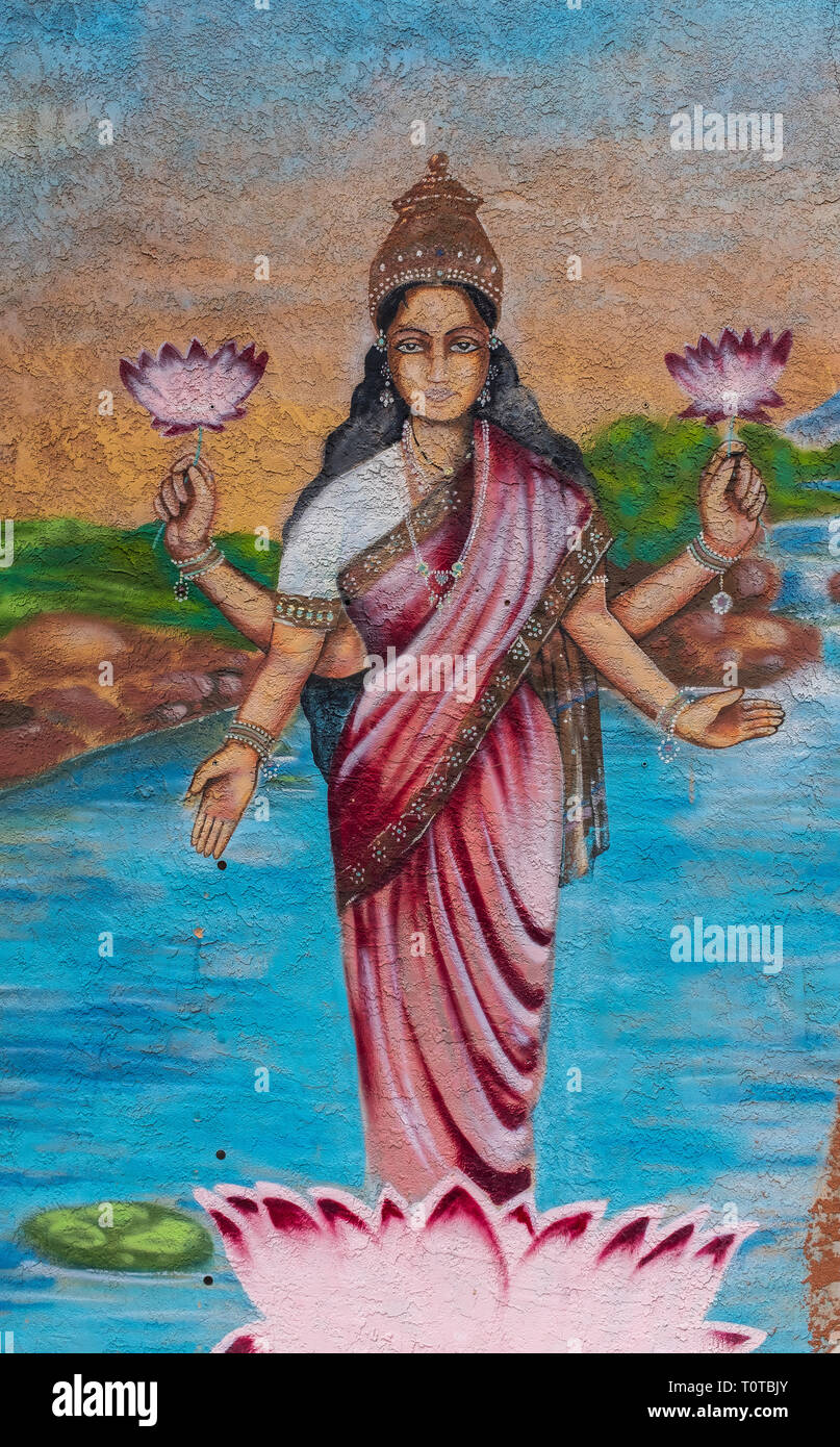 Murale extérieure sur mur au restaurant Annapurna : BrickLight District, Albuquerque, Nouveau Mexique [déesse hindoue Lakshmi] Banque D'Images