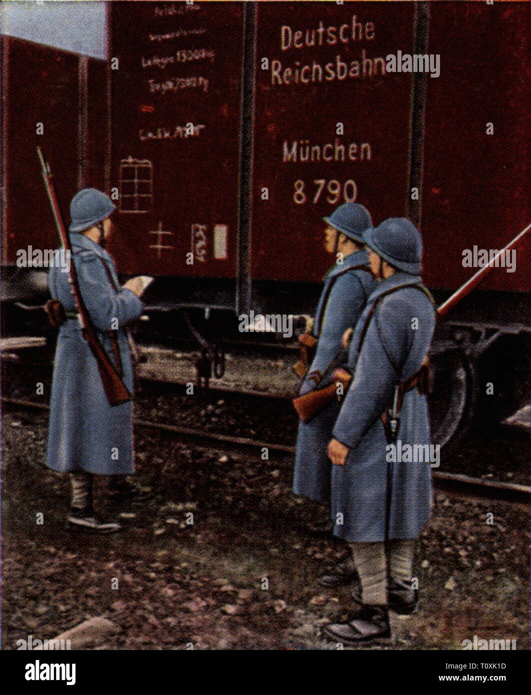 Occupation de la Ruhr 1923 - 1925, le retrait des soldats français de la Ruhr, la préparation pour la restitution de matériel ferroviaire, confisqués le 24 novembre 1924, photographie couleur, carte de cigarette, série 'Die' Nachkriegszeit, 1935, l'évacuation, d'évacuations, de l'armée, des armées, militaire, puissance occupante, puissances d'occupation, la France, l'occupation, de professions, de retour de mars, soldats, soldat, wagon de marchandises, de personnes, de Prusse, Province rhénane, Reich allemand, République de Weimar, Allemagne, 1920, 20e siècle, retrait, retrait, retrait des troupes d', R, Additional-Rights Clearance-Info-Not-Available- Banque D'Images