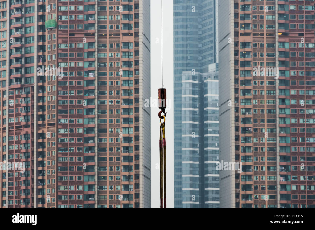 Gratte-ciel de Hong Kong, l'espace restreint, la surpopulation, la construction yard, l'Asie orientale, la Chine, les édifices modernes, simples, grue à tour, de la corde, l'arrière-plan, Banque D'Images