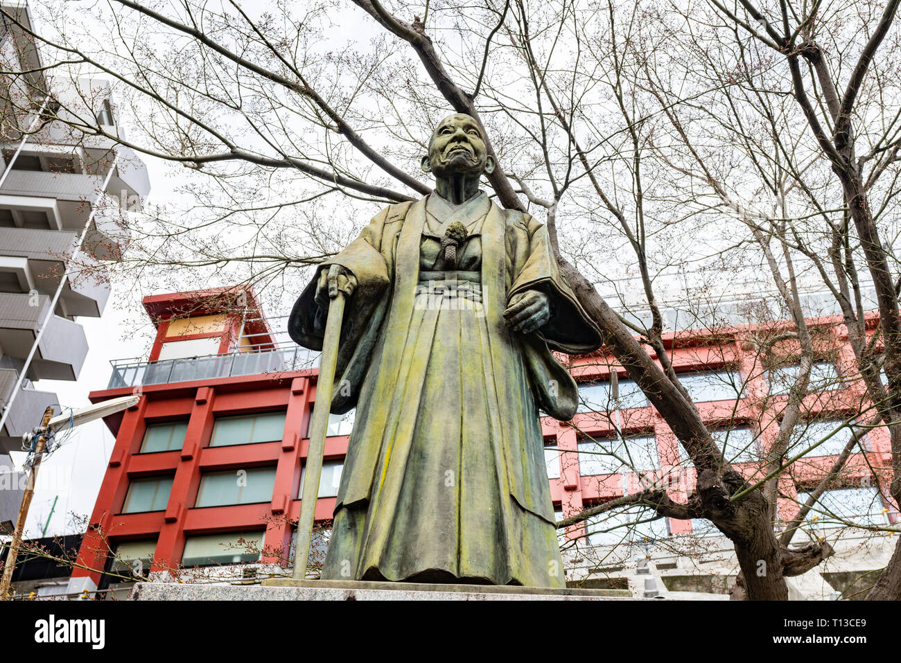 Statue de Tokujiro Ota, Inari Daimyojin, Avenue, la ville de Yokohama, Kanagawa Prefecture, Japan Banque D'Images
