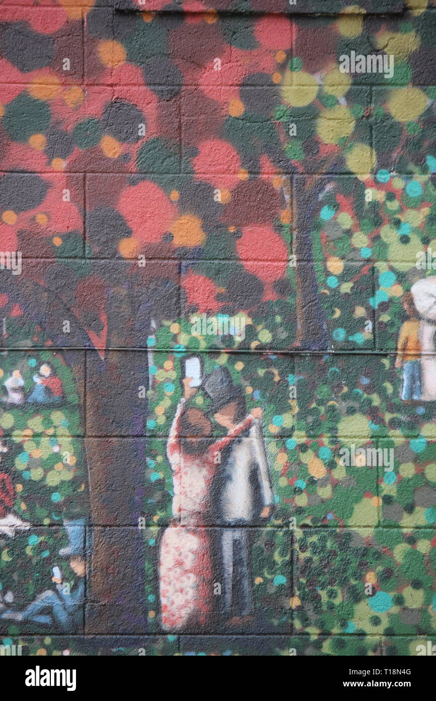 Un pastiche du moderne Georges-Pierre Seurat, un dimanche après-midi sur l'île de La Grande Jatte, un exemple de néo-impressionnisme à Lafayette, Indiana. Banque D'Images