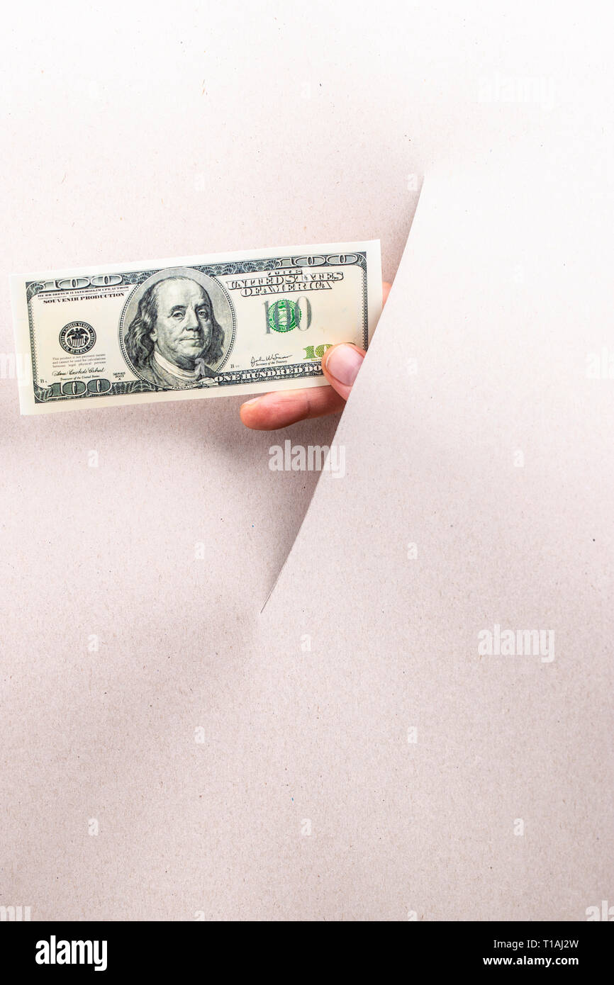 Les feuilles de papier et dollar bills Banque D'Images