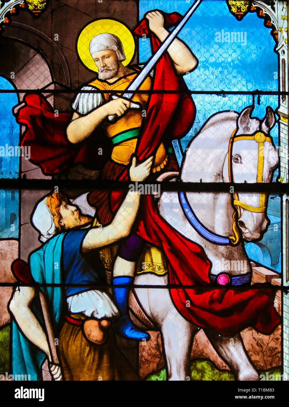 Vitraux dans l'église de Saint Severin, Quartier Latin, Paris, France, représentant St Martin de Tours la distribution d'un morceau de manteau d'un mendiant Banque D'Images
