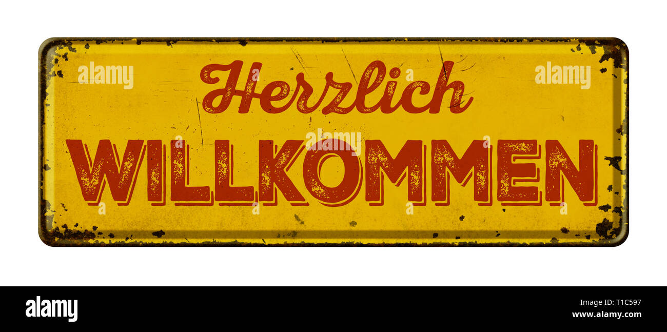 Vintage rusty metal sign - Français pour Bienvenue - Herzlich willkommen Banque D'Images